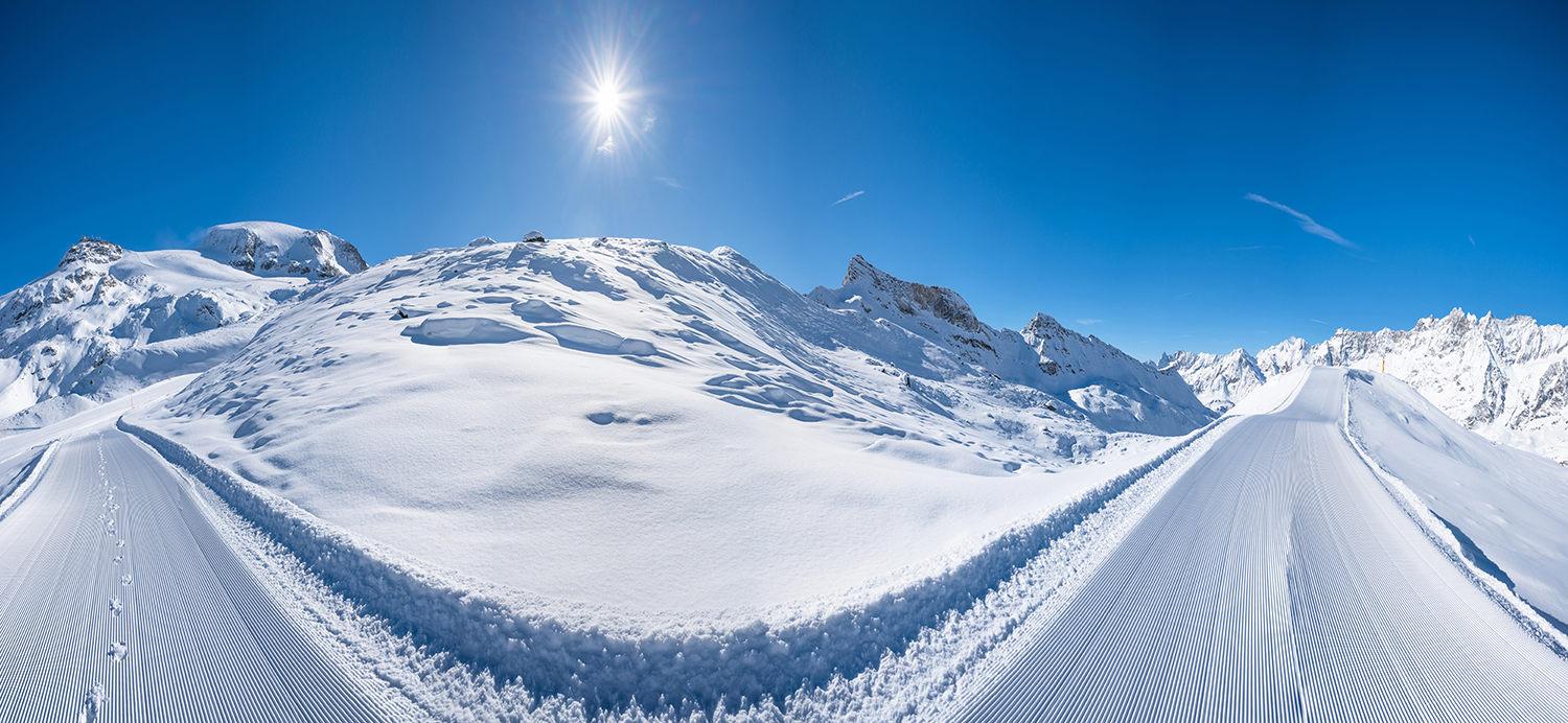 Beautiful panoramic winter landscape with piste