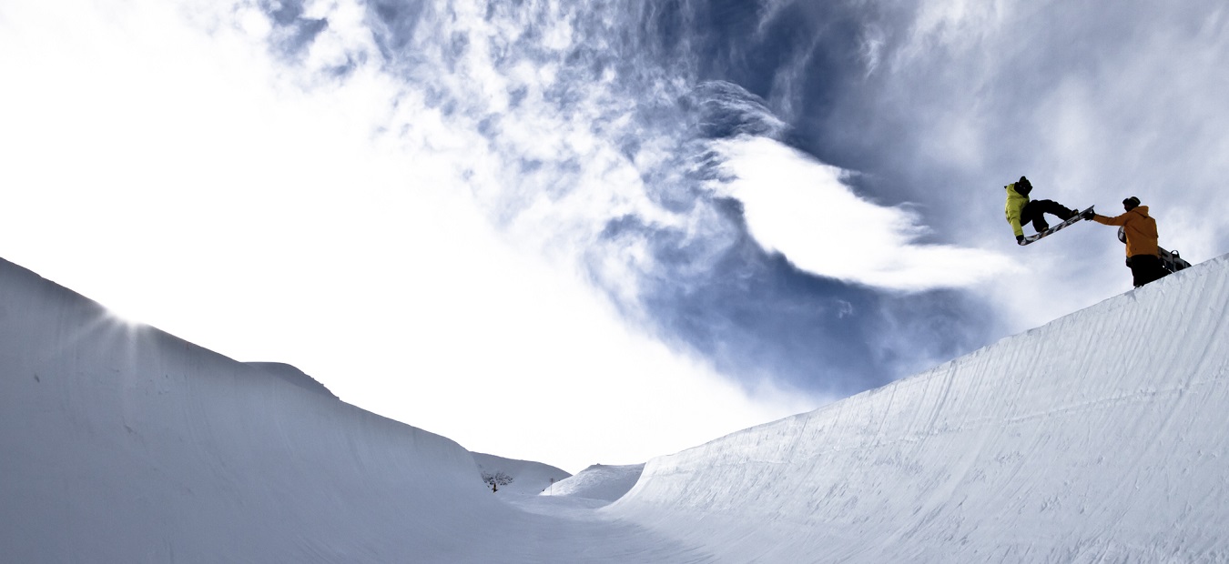 Snowboarder on the half pipe