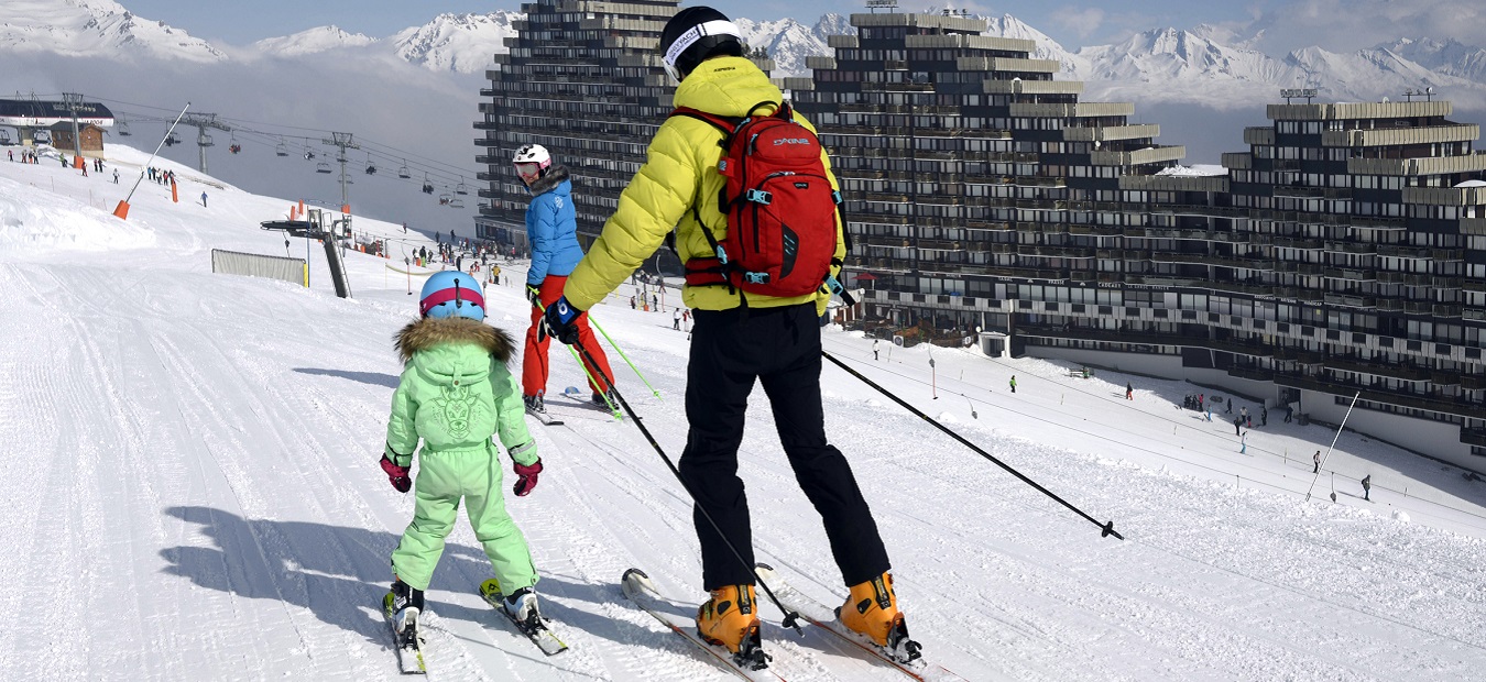 Family skiing in La Plagne