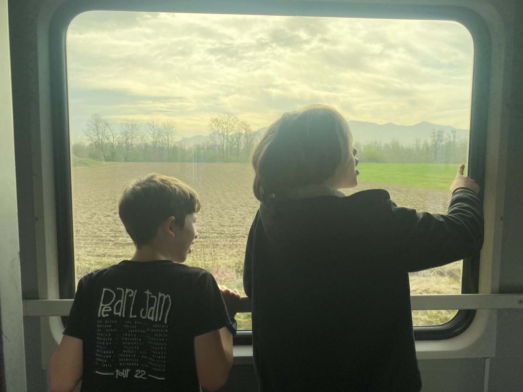 Children checking out the views on the NightJet train