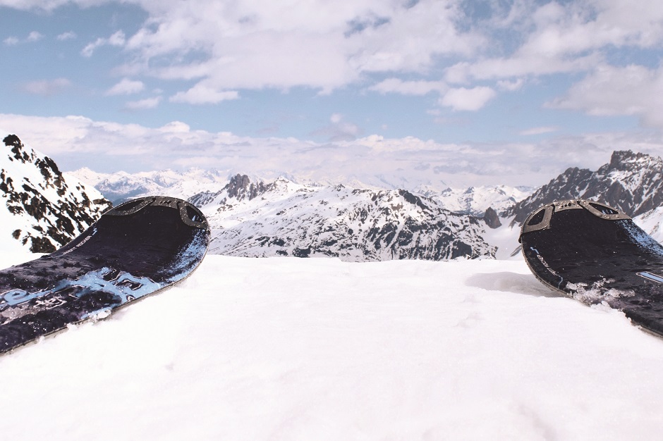 skis over the mountain views 