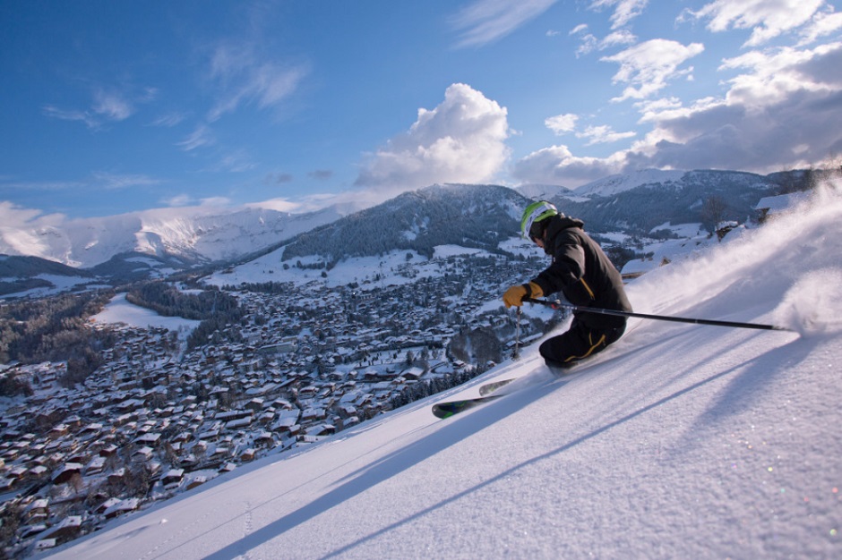 Skier over Megeve town 
