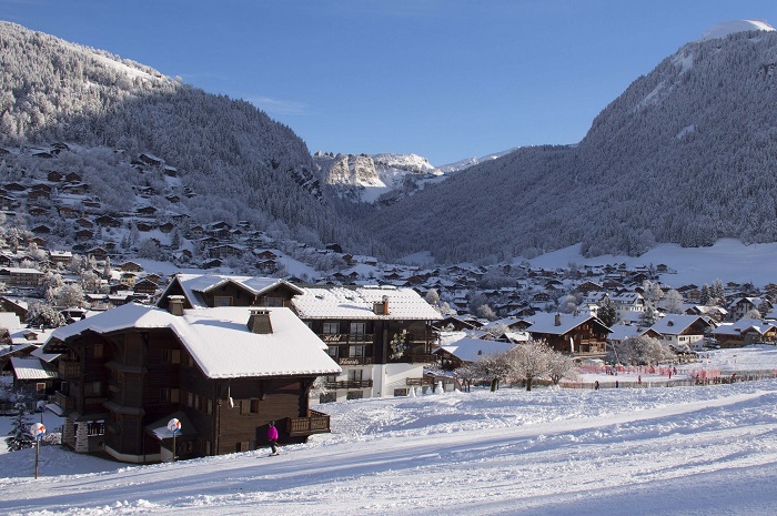 Group accommodation for ski holidays in the French Alps snow covered valley town